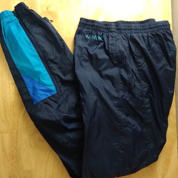 Vintage Nike Spell Out Mesh Lined Wind Pants Joggers Trainers - Picture 1 of 8
